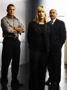MEDIUM -- NBC Series -- Pictured: (l-r) David Cubitt as Detective Lee Scanlon, Patricia Arquette as Allison DuBois, Miguel Sandoval as D.A. Manuel Devalos -- NBC Universal Photo: Andrew EcclesFOR EDITORIAL USE ONLY -- DO NOT RE-SELL/DO NOT ARCHIVE